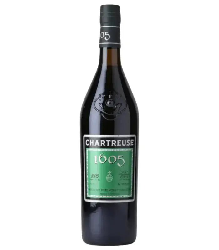 A bottle of Chartreuse 1605 Liqueur d’Elixir from Main Street Liquor, featuring a green label, black cap, and "1605" displayed prominently on the front. This iconic French herbal liqueur’s label is embellished with symbols and French text that emphasize its distinctive botanical character.