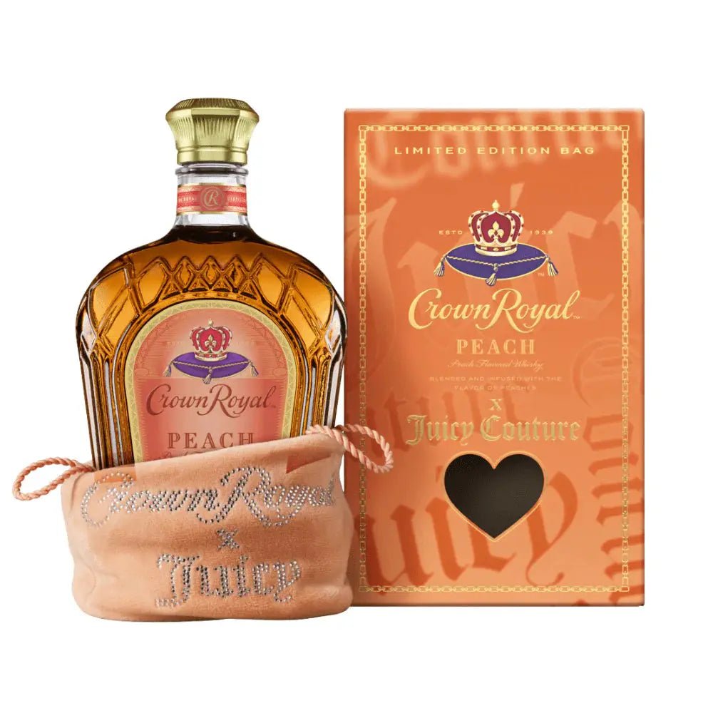 A bottle of Crown Royal Peach X Juicy Couture, the flavorful peach whisky from Crown Royal, rests in a soft peach-colored bag beside a limited edition orange Juicy Couture box adorned with a stylish heart-shaped cutout.