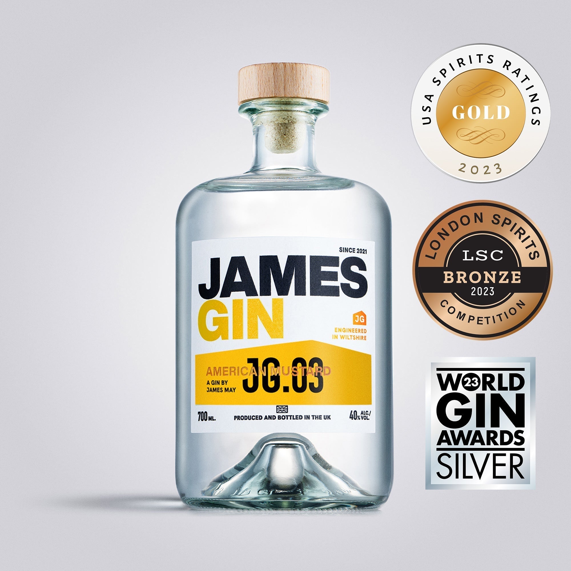 James Gin The Big, Beautiful Bundle W/ Souvenir Gift Key Chain by James Gin US is pictured alongside three award badges: USA Spirits Ratings Gold 2023, London Spirits Competition Bronze 2023, and World Gin Awards Silver 2023.