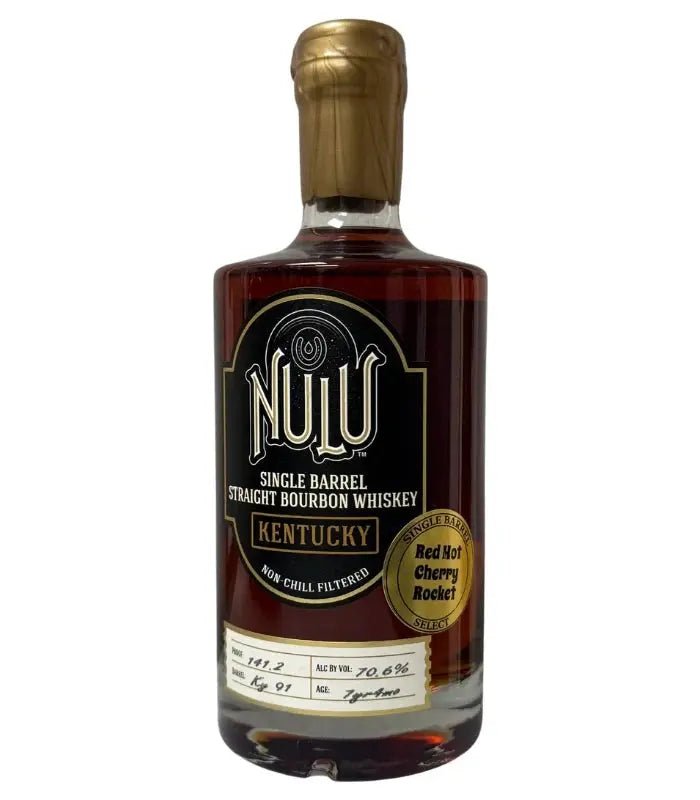 A bottle of Nulu Red Hot Cherry Rocket Single Barrel Bourbon Hazmat Proof from Nulu, featuring a gold wax seal, black label, and a sticker labeled "Red Hot Cherry Rocket." This high-proof hazmat bourbon boasts an impressive 70.6% alcohol content.