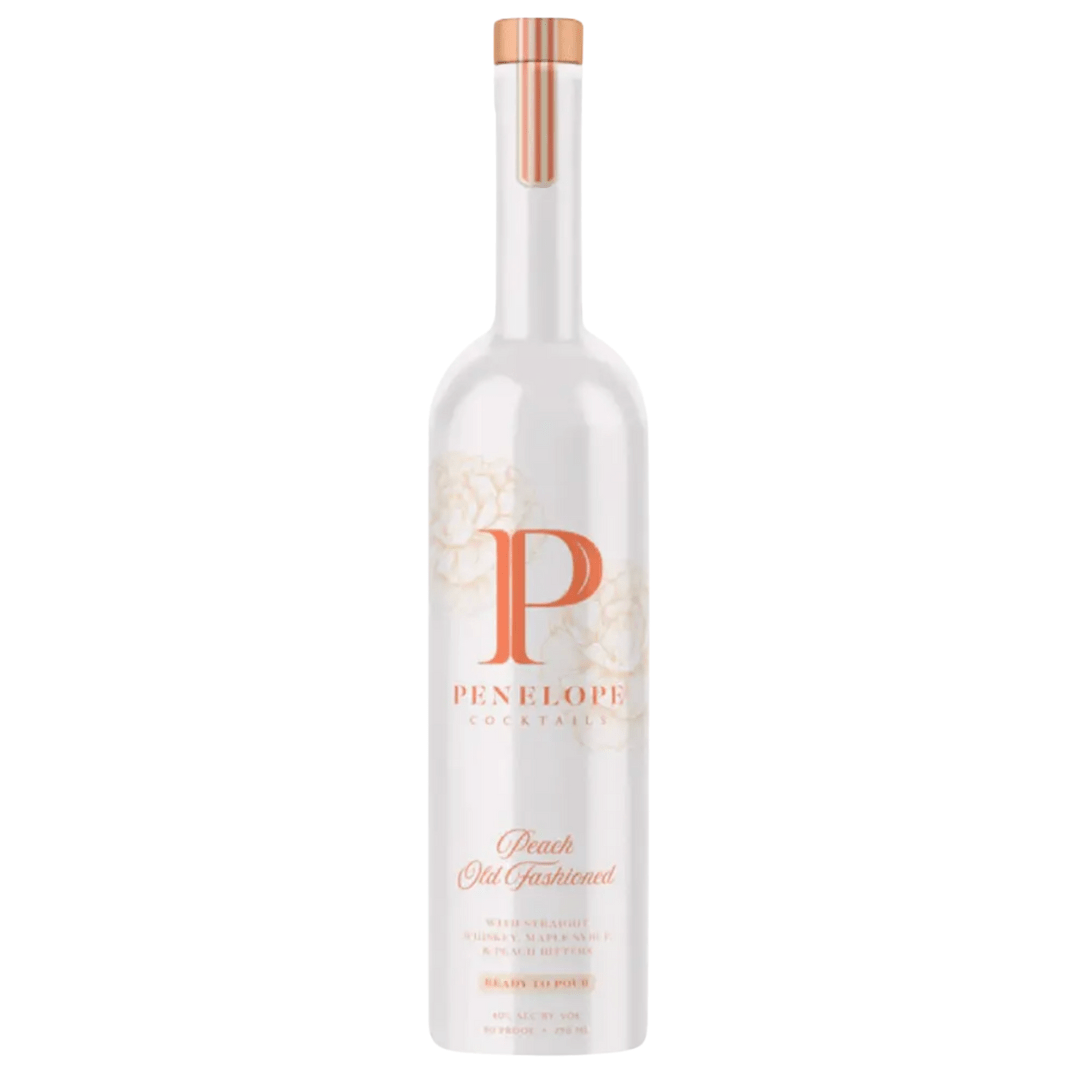 A tall white bottle with floral accents, a copper-toned cap, and elegant script displays Penelope Peach Old Fashioned by Penelope Bourbon—a ready-to-pour cocktail capturing the essence of their bourbon.