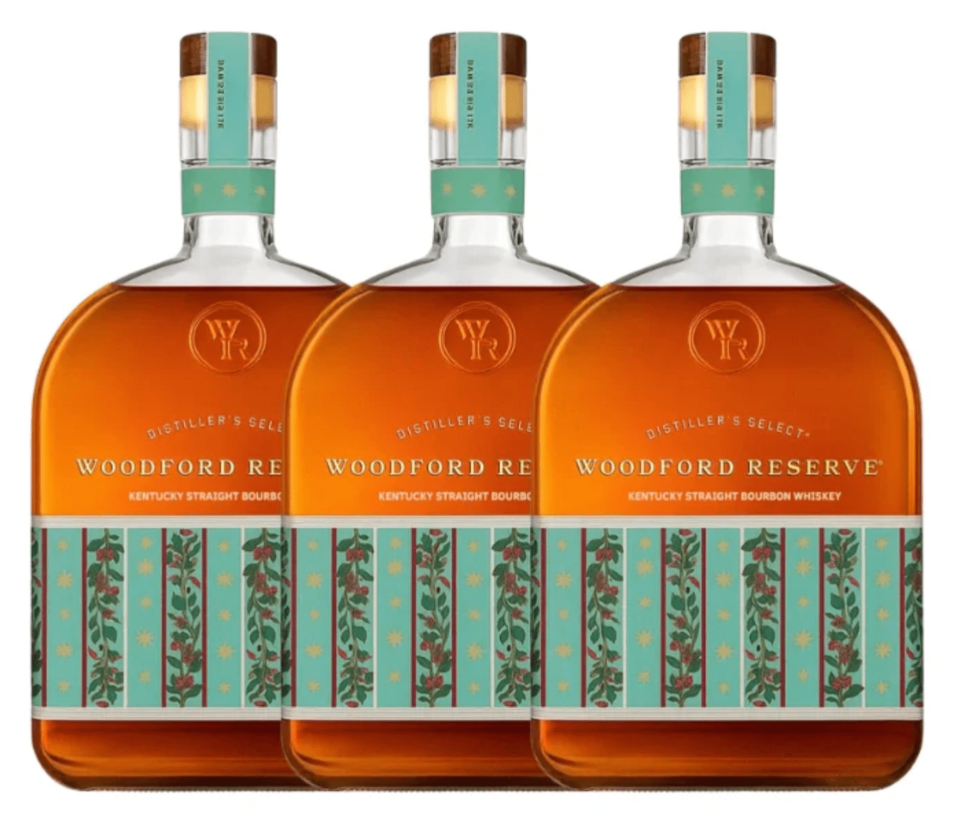 Three bottles of Woodford Reserve Holiday Edition Bourbon 2025 “Designed by Markarian” 3 Pack are displayed with teal and floral-patterned labels and caps, highlighting this limited edition from Woodford Reserve against a white background.