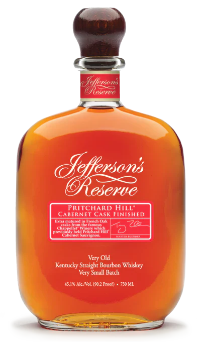 A bottle of Jefferson’s Pritchard Hill Cabernet Cask Finished whiskey by Jefferson’s, with a red and white label featuring gold script on clear glass filled with amber liquid.
