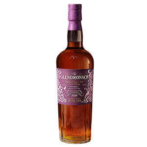 A bottle of The GlenDronach Boynsmill House Edition 14 Year Highland Single Malt Scotch Whisky by Glendronach, featuring a purple foil cap and an ornate purple label that highlights its sherry-cask aging, is displayed upright on a white background.