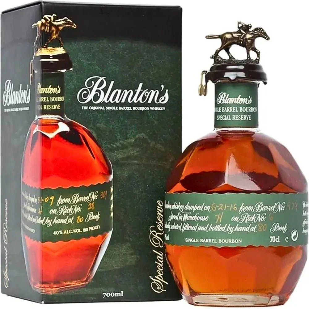 A bottle of Blanton's Green Label Bourbon 700ml by Blanton's Bourbon stands next to its black and green box, featuring a horse and jockey stopper and distinctive green label—a true collector’s item.