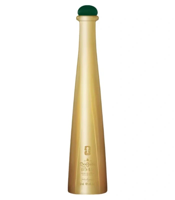 A tall, sleek metallic gold Don Julio 1942 FIFA World Cup 2026 Limited Edition 50mL bottle with a green cap and minimal front text stands upright against a white background.