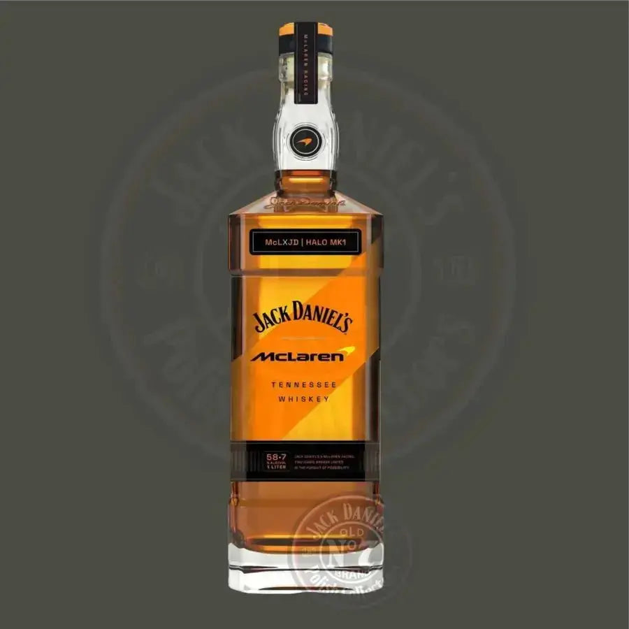 The Jack Daniel’s X McLaren Halo Prestige Tennessee Whiskey Limited Edition 1L features McLaren and Halo MK1 branding, a sleek black and orange label, and a unique rectangular bottle—perfect for Formula 1 collectors.