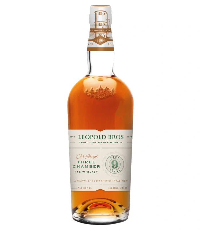 Leopold Bros 9 Year Three Chamber Cask Strength Rye Whiskey, 750ml, features a gold cap and a white-green label. This amber spirit makes a distinctive alternative to any classic bourbon gift set.