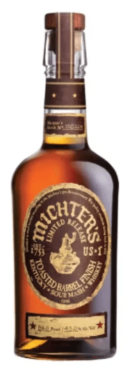 A bottle of Michter's US-1 Toasted Barrel Finish Sour Mash Kentucky Straight Whiskey 2025 Limited Edition with a dark label, gold lettering, and a wax-sealed cap.