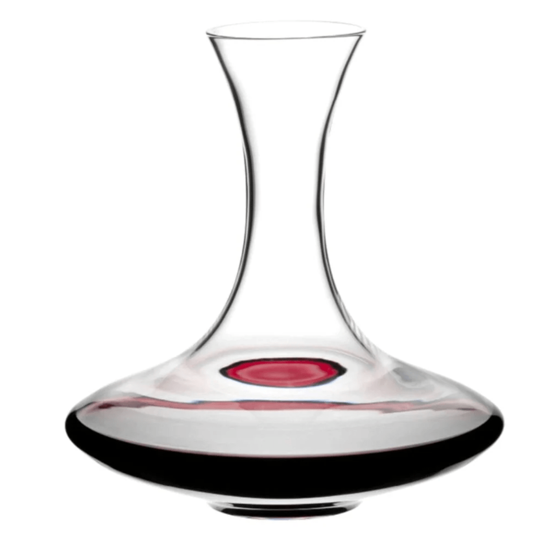The Riedel Wine Decanter Ultra Magnum, with its wide base and narrow neck designed for optimal wine aeration, is partially filled with red wine and showcased against a white background.